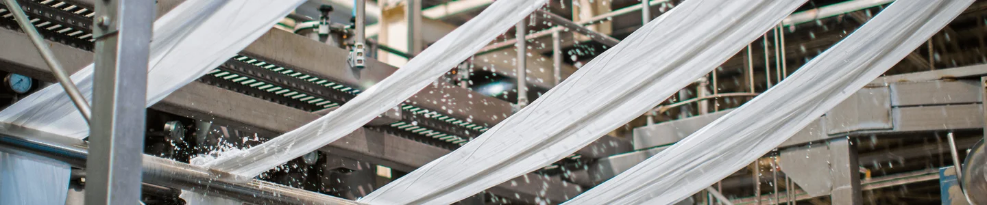 A close up of Gildan's white fabric in the textile facility.